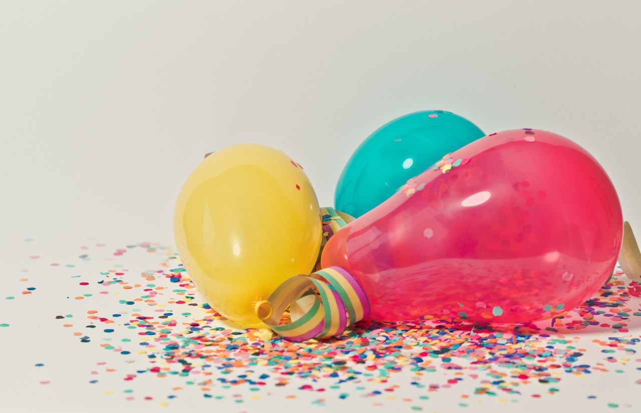 Tre ballonger i olika färger